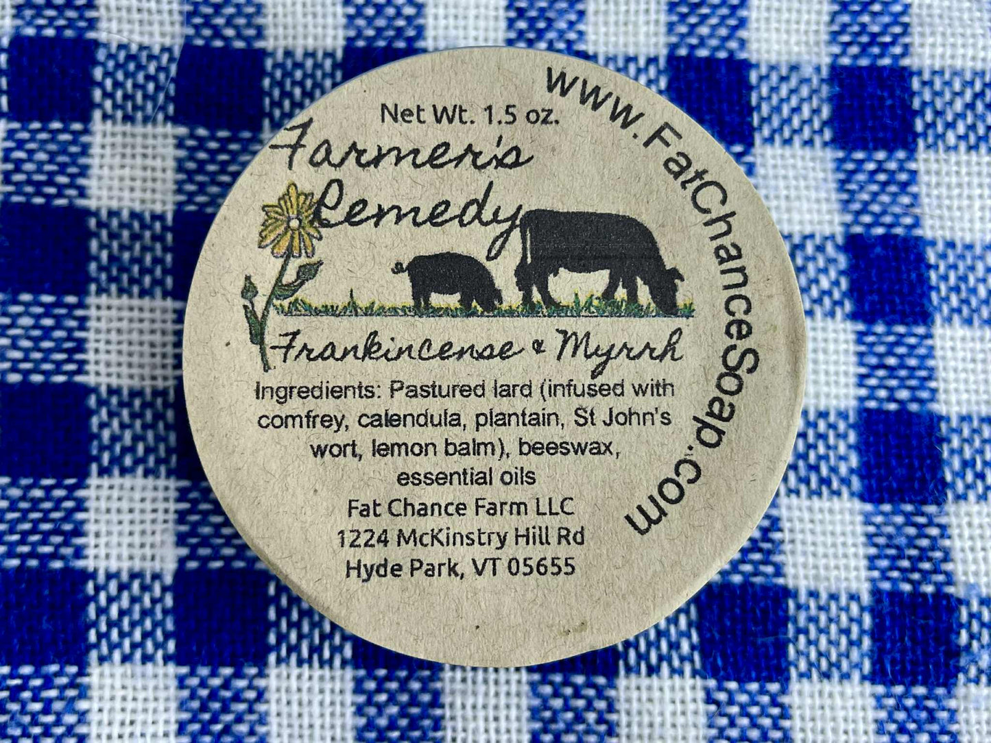 a tin of herbal lard salve