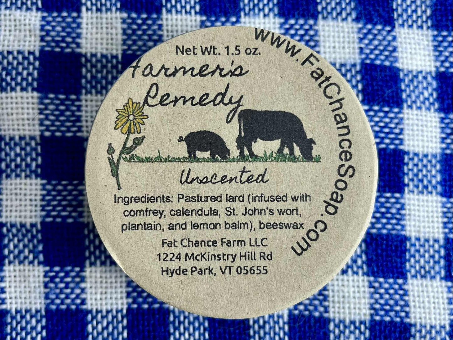 a tin of herbal lard salve
