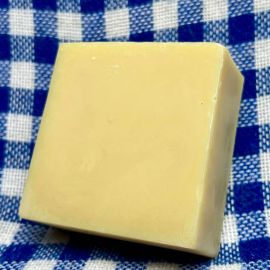 bar of soap on a blue and white checkered cloth