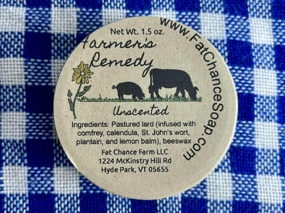 a tin of herbal lard salve